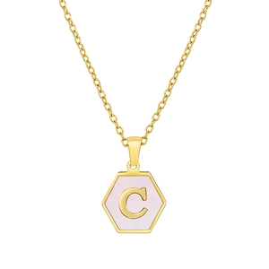Detailed view of hexagonal gold letter C pendant with pink enamel and a fine chain link