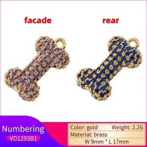 Luxurious bone-shaped heart pendant in purple and blue zircon with gold-plated brass