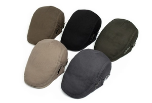 Detail view of five summer breathable mesh newsboy hats with adjustable metal buckles