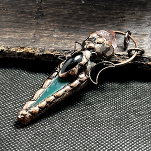Vintage bronze necklace with obsidian, turquoise and pink crystal in a mystical totem design