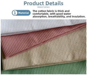 Detail of waffle weave cotton napkins showing absorbent texture in multiple soft colors