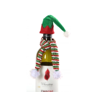 Detailed close-up of Christmas elf wine bottle set with red and green knitted hat and scarf