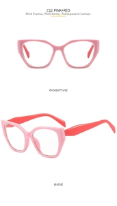 Macro detail of cat eye frame with pink front, red temples and clear lenses