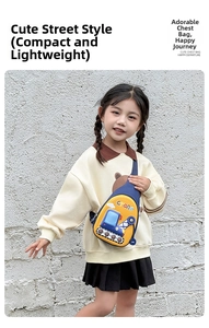 Detail shot of a yellow and blue cartoon crane chest bag worn by a young child outdoors