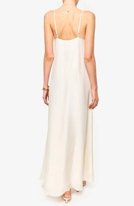 Detail of white backless maxi dress showing lightweight woven fabric and fine texture