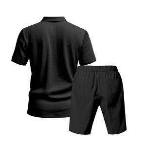Detail of the textured waffle knit fabric on the back of the black men's polo and shorts set