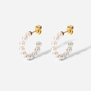 French style C-shaped stud earrings with small pearls and gold-plated metal base