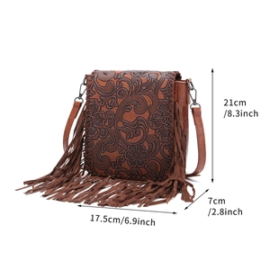 Detailed side view of Bohemian floral embossed crossbody bag with fringe, dimensions shown