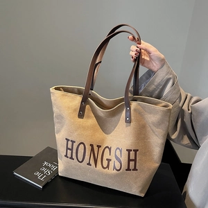 Large capacity khaki canvas tote bag with brown leather handles and HONGSH printed logo