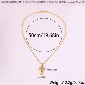 Detailed view of golden cross pendant with dimensions 3.1x1.7cm and necklace weight 12.2g