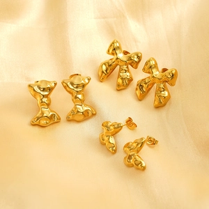 Three pairs of elegant 18K gold-plated butterfly and abstract bow-knot stud earrings