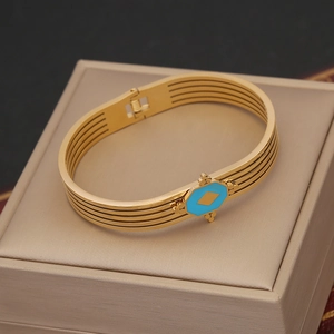 Vintage gold-plated stainless steel layered bangle with turquoise hexagonal inlay
