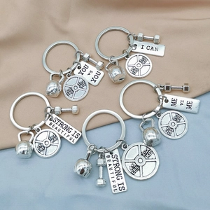 Set of 6 fitness-themed metal keychains with barbell, kettlebell and motivational charms