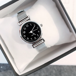Women's minimalist vintage quartz watch with silver mesh band and black dial in gift box