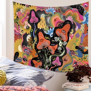 Detailed view of a psychedelic mushroom and eye tapestry hung as a bedroom backdrop