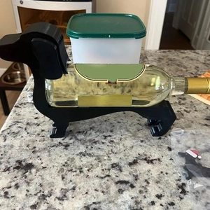 Creative black dachshund wine bottle holder accessory for kitchen countertop display