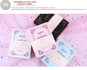 Detailed top view of four colorful mini bilingual book of answers notebooks on pink mesh