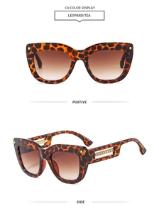 Detail of leopard print square frames with gradient tea lenses and gold chain temples