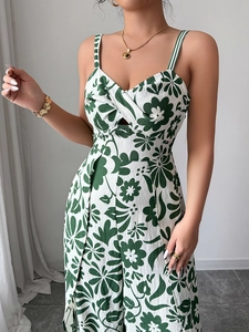 Detailed close-up of floral print wide-leg jumpsuit with knot and cutout chest detail