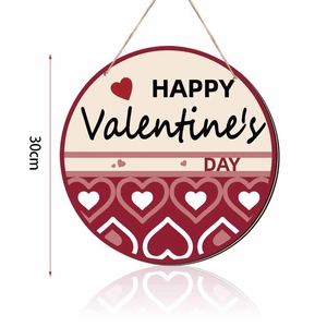Close-up of 30cm pink and red Happy Valentine's Day round wooden hanging sign with heart patterns