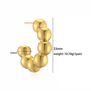 Detail view of gold bead C-shape hoop earrings showing 33mm height and 8.8mm bead diameter