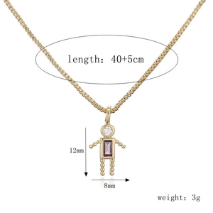 Detail of golden boy pendant with purple zircon and dimensions 12mm by 8mm