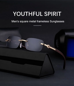 Detail of luxury rimless sunglasses with wooden grain temples and gold metal C-decor