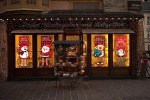 Christmas door banner featuring Santa, Reindeer, and Gnome on red plaid backdrop