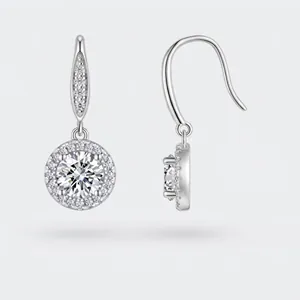 Detail of S925 sterling silver halo drop earrings featuring brilliant cut moissanite stones