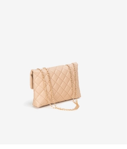 Close-up of beige quilted crossbody bag with luxury leather texture and gold chain strap
