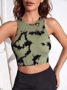 Close-up of olive green tie-dye seamless ribbed knit yoga vest fabric and texture