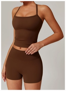 Detail view of brown matte yoga set featuring a square neck top and high-waisted shorts