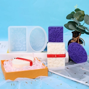 Dual-cavity silicone soap mold featuring intricate Tree of Life and floral patterns