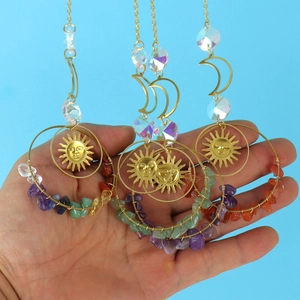 Bohemian sun catcher with gold crescent moon, colorful crystal stones and celestial charms