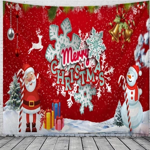 Macro detail of Christmas tapestry showing Merry Christmas text and festive snowman pattern