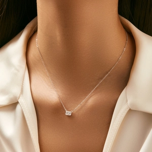 Elegant S925 sterling silver necklace with sparkling square cut crystal on model