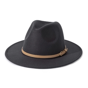 Detail of black wool fedora hat featuring a khaki leather band with a gold buckle
