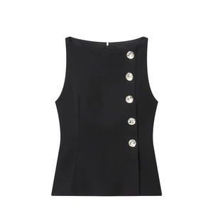 Women's black sleeveless top with crystal jewel buttons on white background