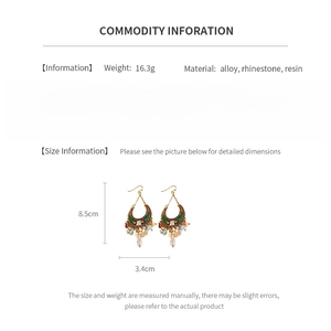 Detailed size specifications for bohemian crescent moon drop earrings with tassel and rhinestones