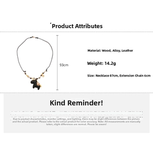 Detail showing vintage black horse pendant with acrylic beads on long leather necklace
