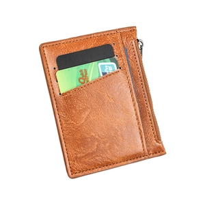 Slim brown leather card holder wallet with multiple slots and a secure zipper pocket