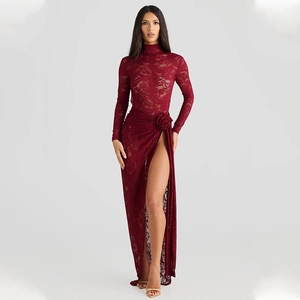 Detail view of red lace dress featuring high side slit and 3D floral waist decoration