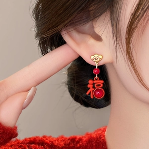 Asymmetric Chinese God of Wealth earrings with red Fu pendant and golden heart studs