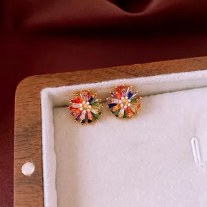Sparkling rainbow zircon flower stud earrings in luxury gold finish for women
