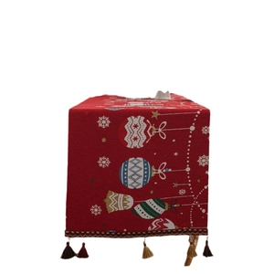 Red Christmas table runner with festive bells and snowflakes pattern and tassels