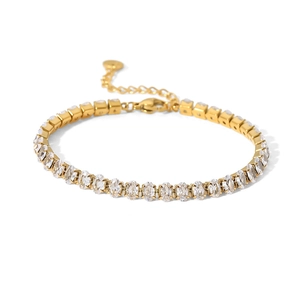 18K gold-plated tennis bracelet featuring oval clear zircons with lobster clasp closure