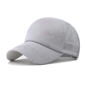 Detail of breathable mesh baseball cap with colorful sequins and reflective finish