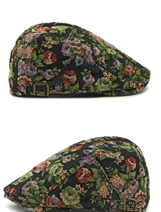 Detailed macro view of retro floral jacquard pattern and bronze metal adjustment buckle