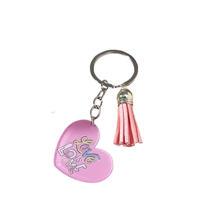 Pink heart acrylic keychain with LOVE is LOVE print and matching pink tassel accessory