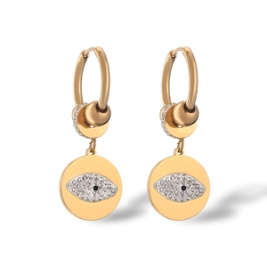 Minimalist gold-plated evil eye hoop earrings with zircon stones on white background